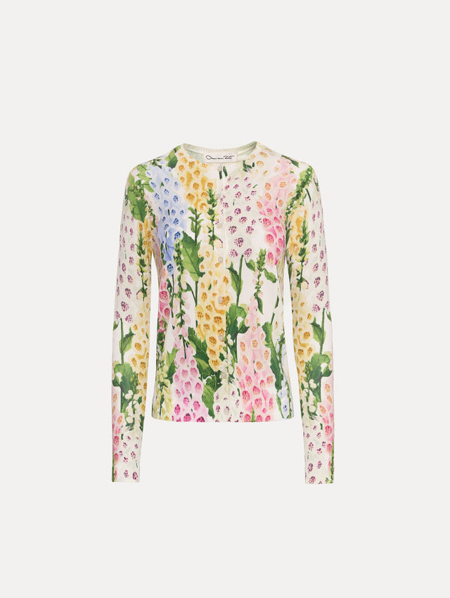 White Foxglove Printed Cardigan featuring multicolor foxglove motifs in yellow, pink, and green.
