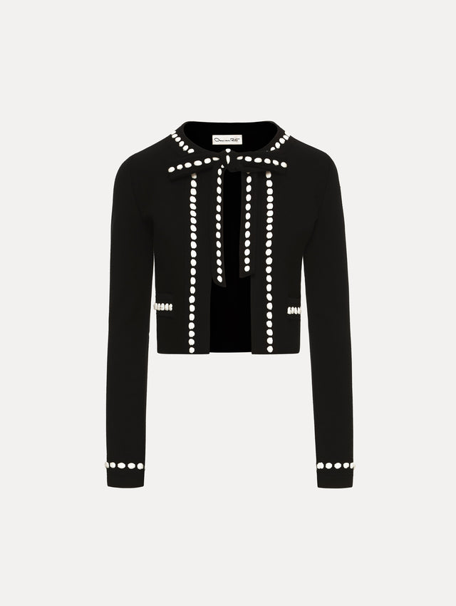 Black and White Bubble Trim Cardigan featuring white beaded trim, long sleeves, and a tie-neck collar.