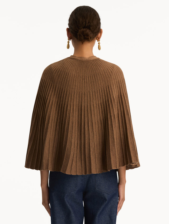 Brown Knit Capelet featuring a tie-neck closure, button front, and cropped silhouette. Back View.