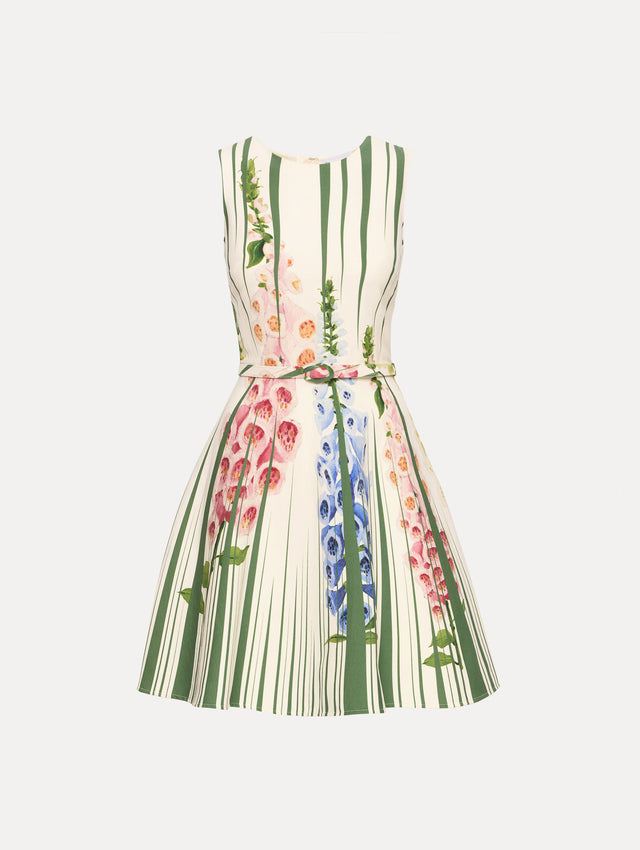 Ivory and Green Foxglove Trompe L’oeil Dress with vertical green stripe accents and multicolor foxglove floral print, finished with a slim matching belt.