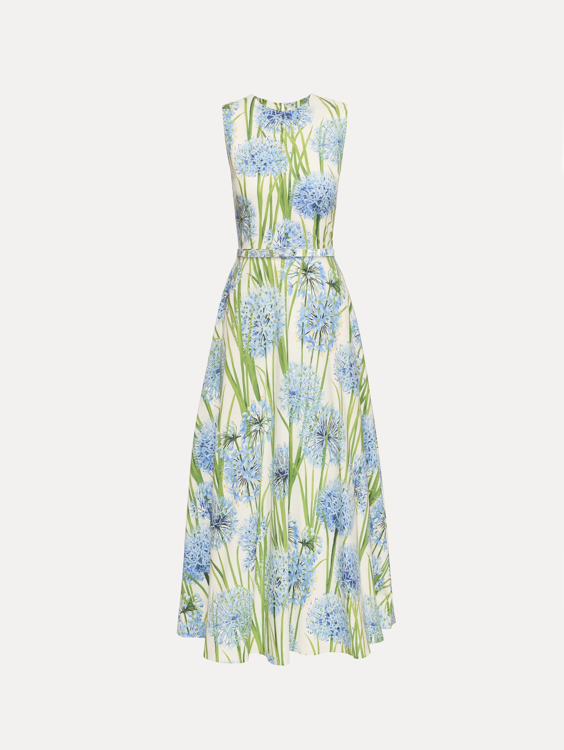 Ivory Allium Cotton Poplin Dress with belted waist and blue and green floral pattern.