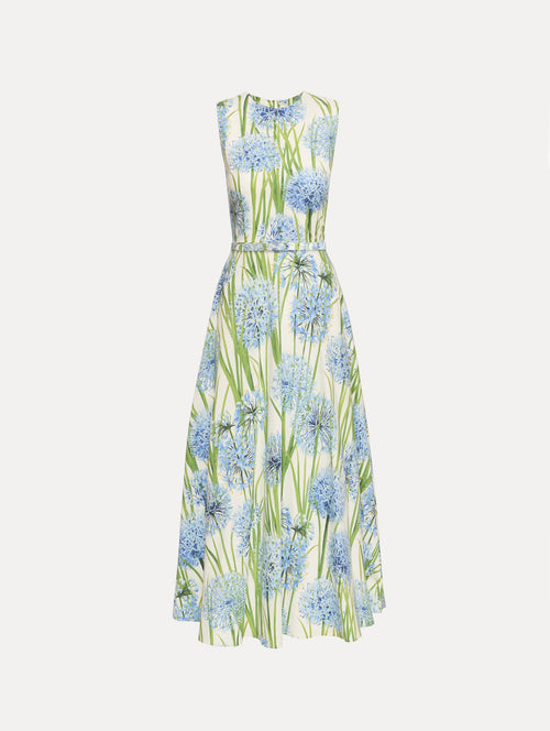 Ivory Allium Cotton Poplin Dress with belted waist and blue and green floral pattern.