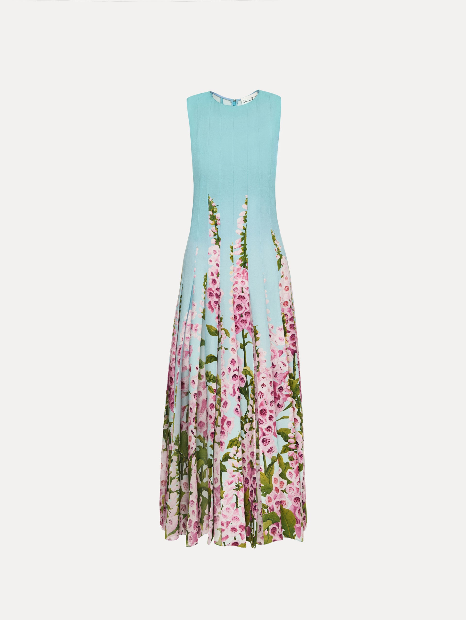 Blue Degradé Foxglove Chiffon Inset Dress featuring vertical pleats and a multicolor pink floral motif rising from the hem.