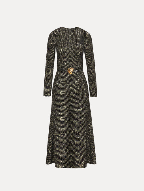 Black and Ivory Chevron Wool Dress featuring long-sleeves and a fitted waist with a sculptural gold heart accent.