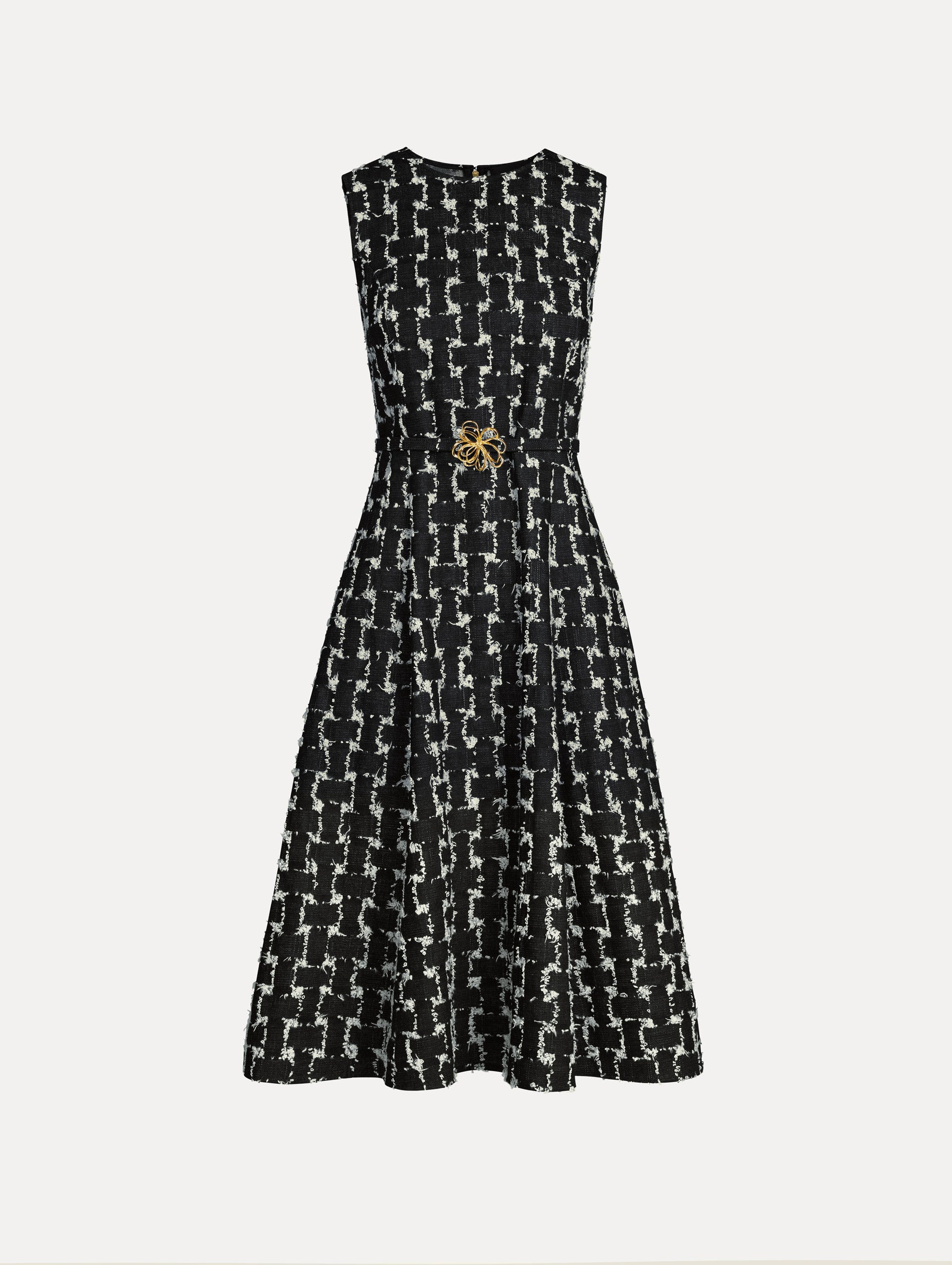 Black and Ivory Woven Denim Jacquard Midi Dress featuring a pleated skirt and belted waist with gold flower detail. Front View.