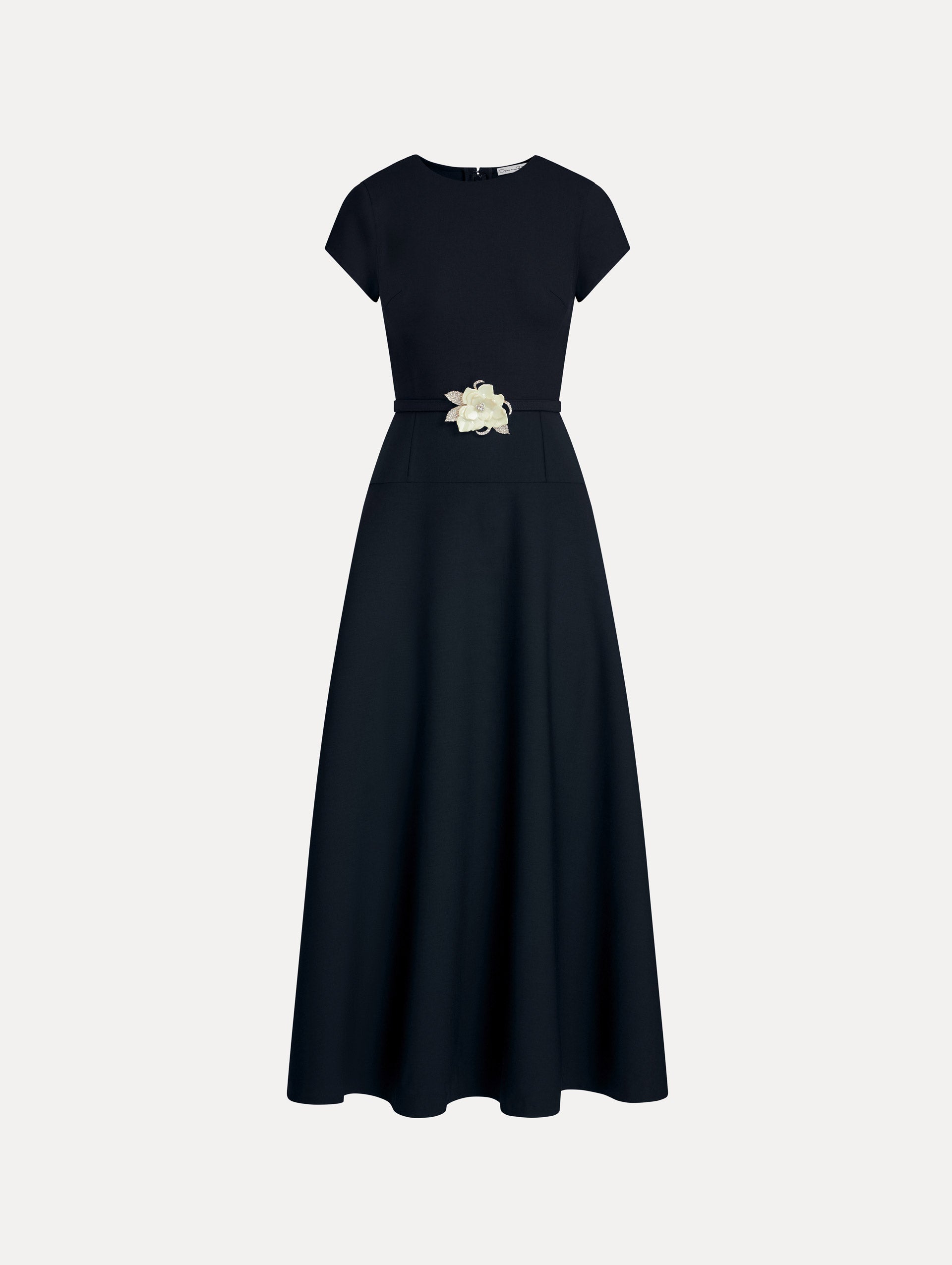 Navy Floral Belt Short Sleeve Dress with short sleeves and a belted waist featuring a white floral accent. Front View.