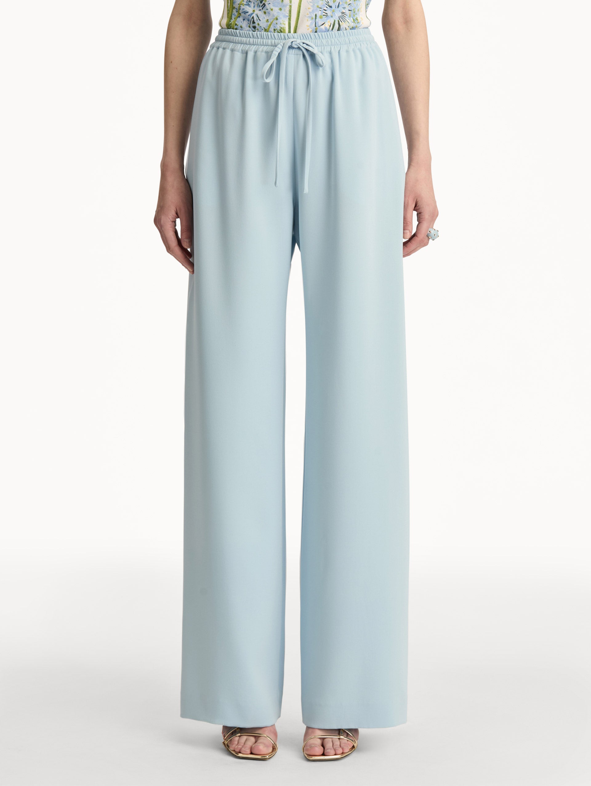 Sky Blue Silk Georgette Drawstring Pant with high drawstring waist and flowy silhouette. Front View.