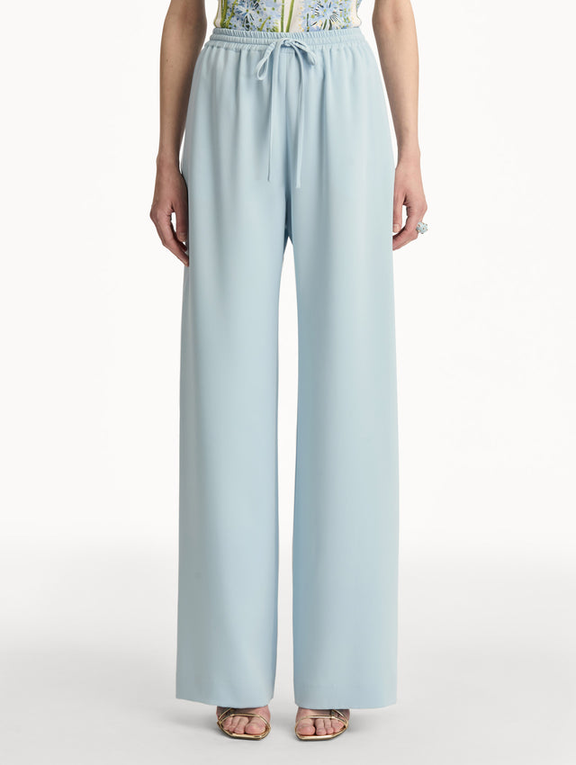 Sky Blue Silk Georgette Drawstring Pant with high drawstring waist and flowy silhouette. Front View.