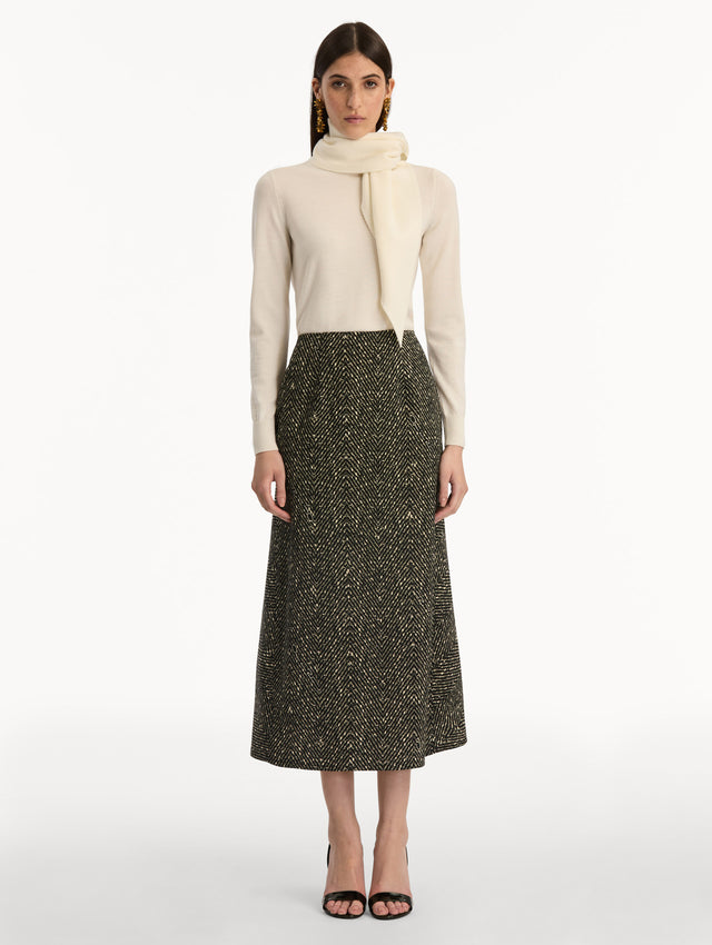 Black and Ivory Chevron Wool Skirt, featuring a high waist and flared silhouette. Front View.