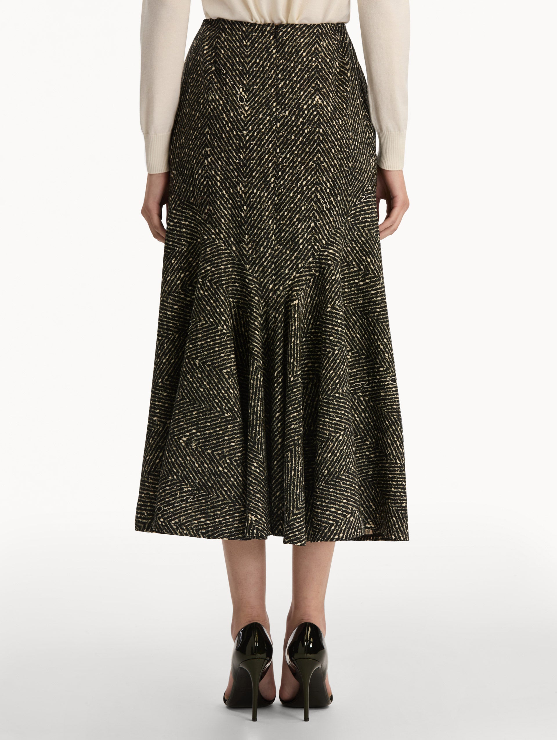 Black and Ivory Chevron Wool Skirt, featuring a high waist and flared silhouette. Back View.