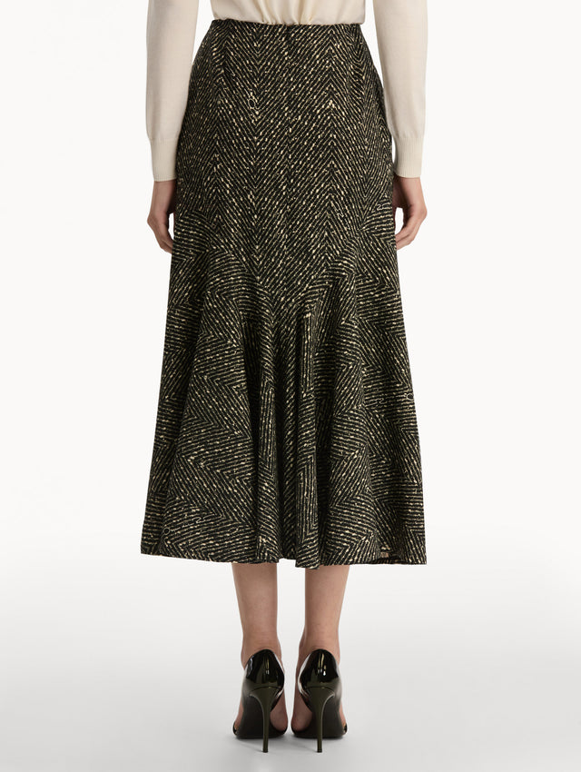 Black and Ivory Chevron Wool Skirt, featuring a high waist and flared silhouette. Back View.