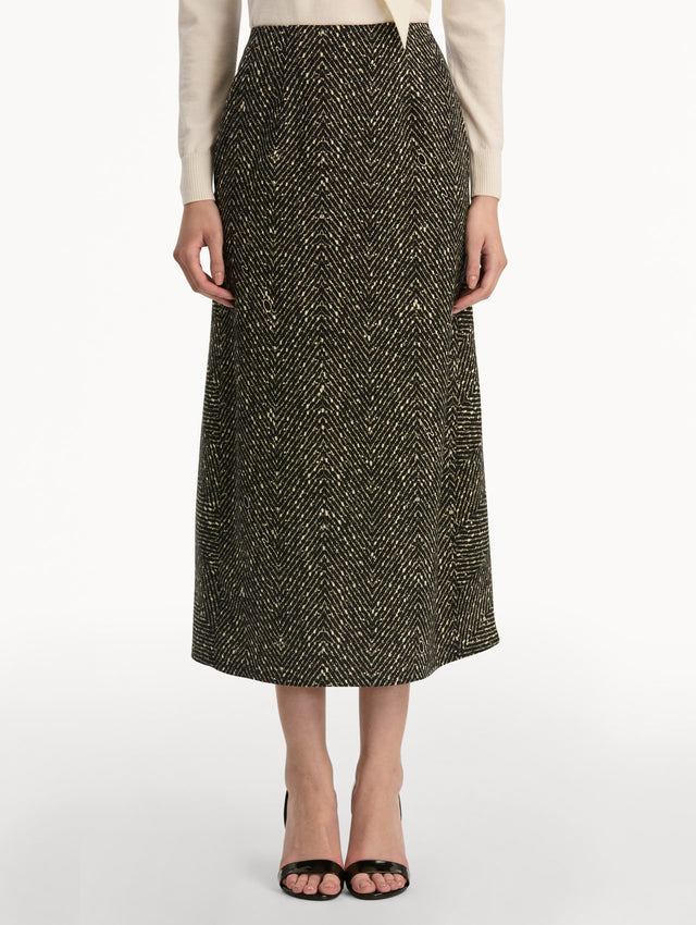 Black and Ivory Chevron Wool Skirt, featuring a high waist and flared silhouette. Front View.
