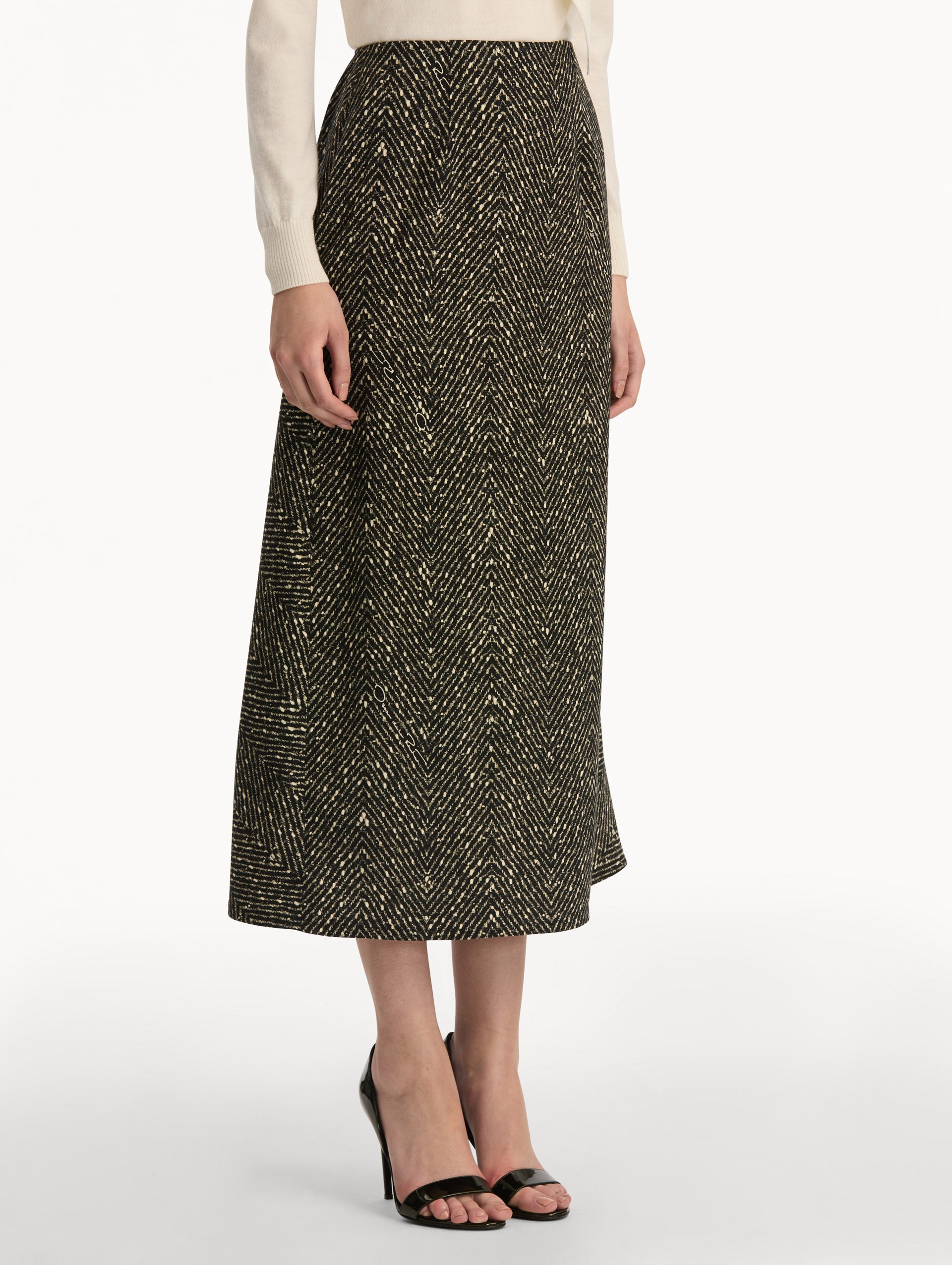 Black and Ivory Chevron Wool Skirt, featuring a high waist and flared silhouette. Back View.