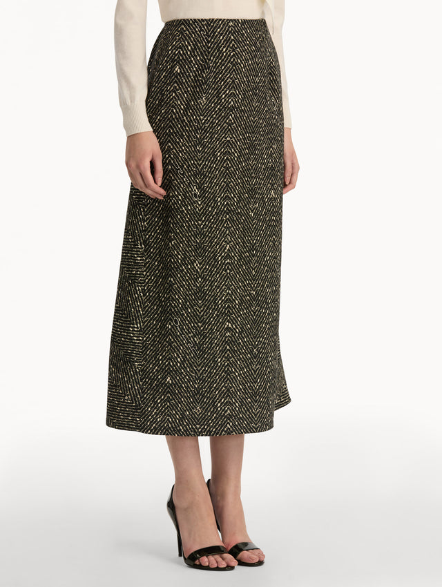 Black and Ivory Chevron Wool Skirt, featuring a high waist and flared silhouette. Back View.