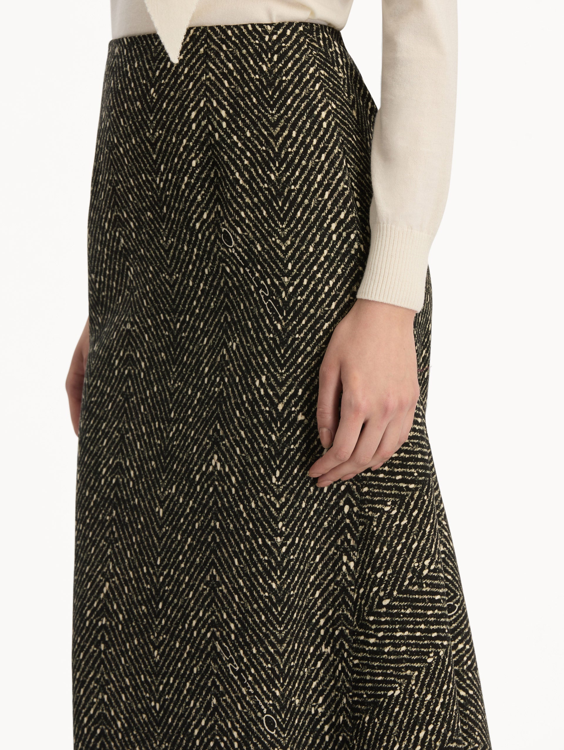 Black and Ivory Chevron Wool Skirt, featuring a high waist and flared silhouette. Zoom View.