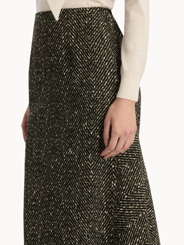Black and Ivory Chevron Wool Skirt, featuring a high waist and flared silhouette. Zoom View.