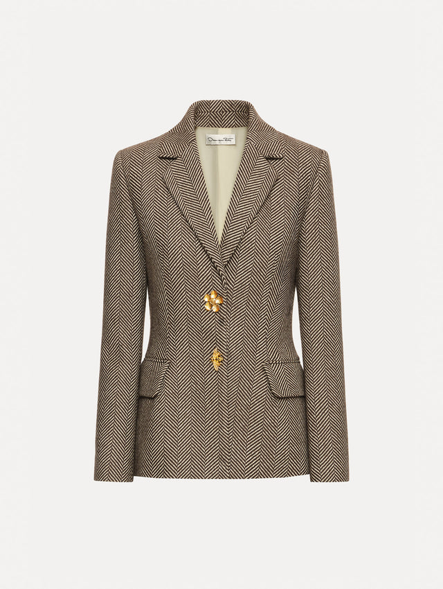 Brown and Ivory Chevron Cashmere-Blend Jacket featuring peak lapels, flap pockets, tailored seams, and gold floral buttons.