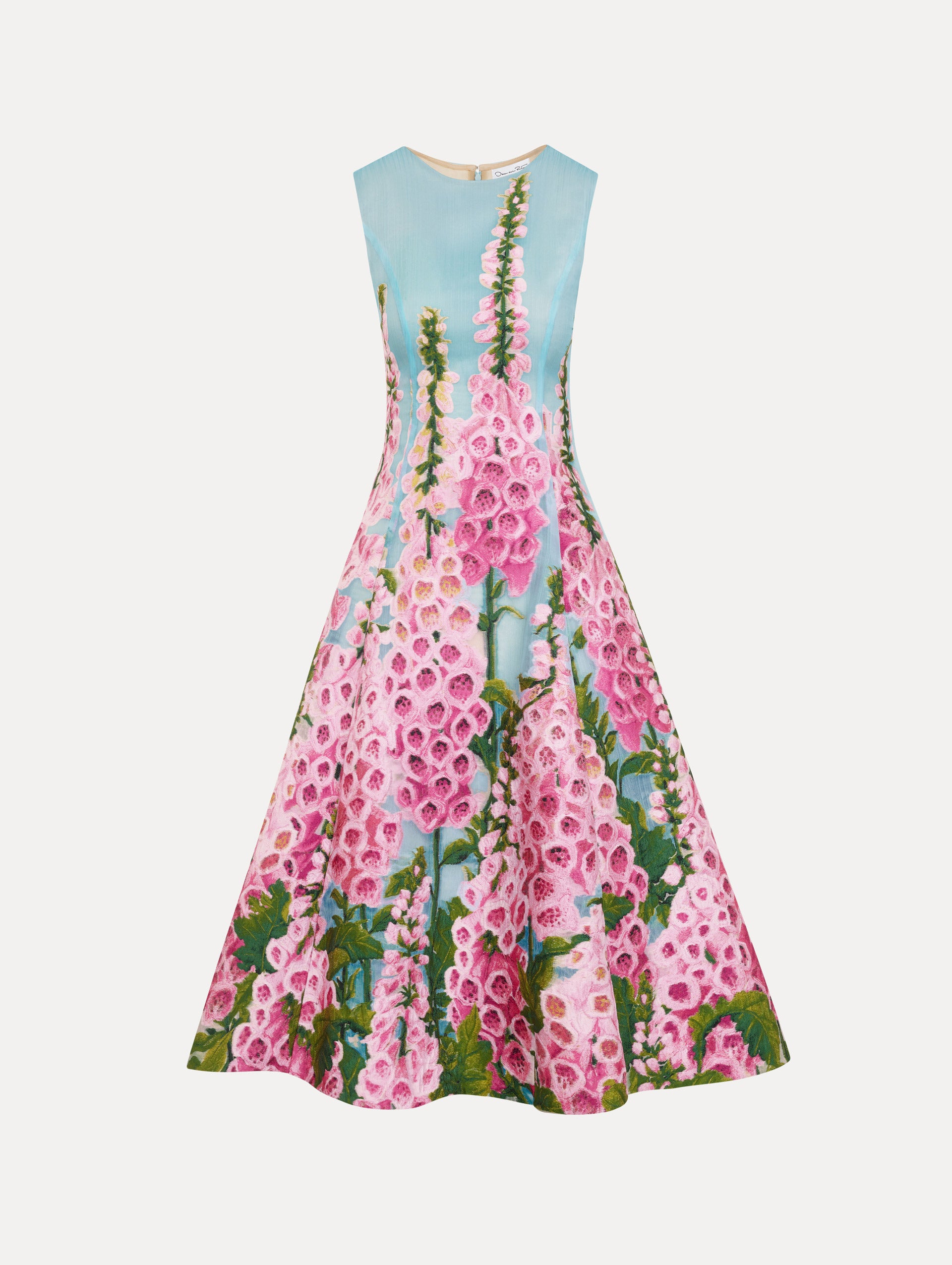 The Foxglove Organza Cocktail Dress in blue, featuring foxglove florals and sheer fabric. Front View.