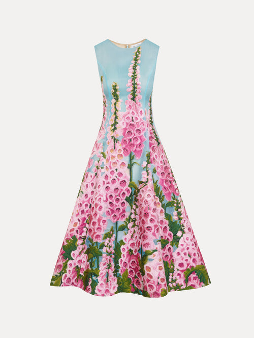 The Foxglove Organza Cocktail Dress in blue, featuring foxglove florals and sheer fabric. Front View.