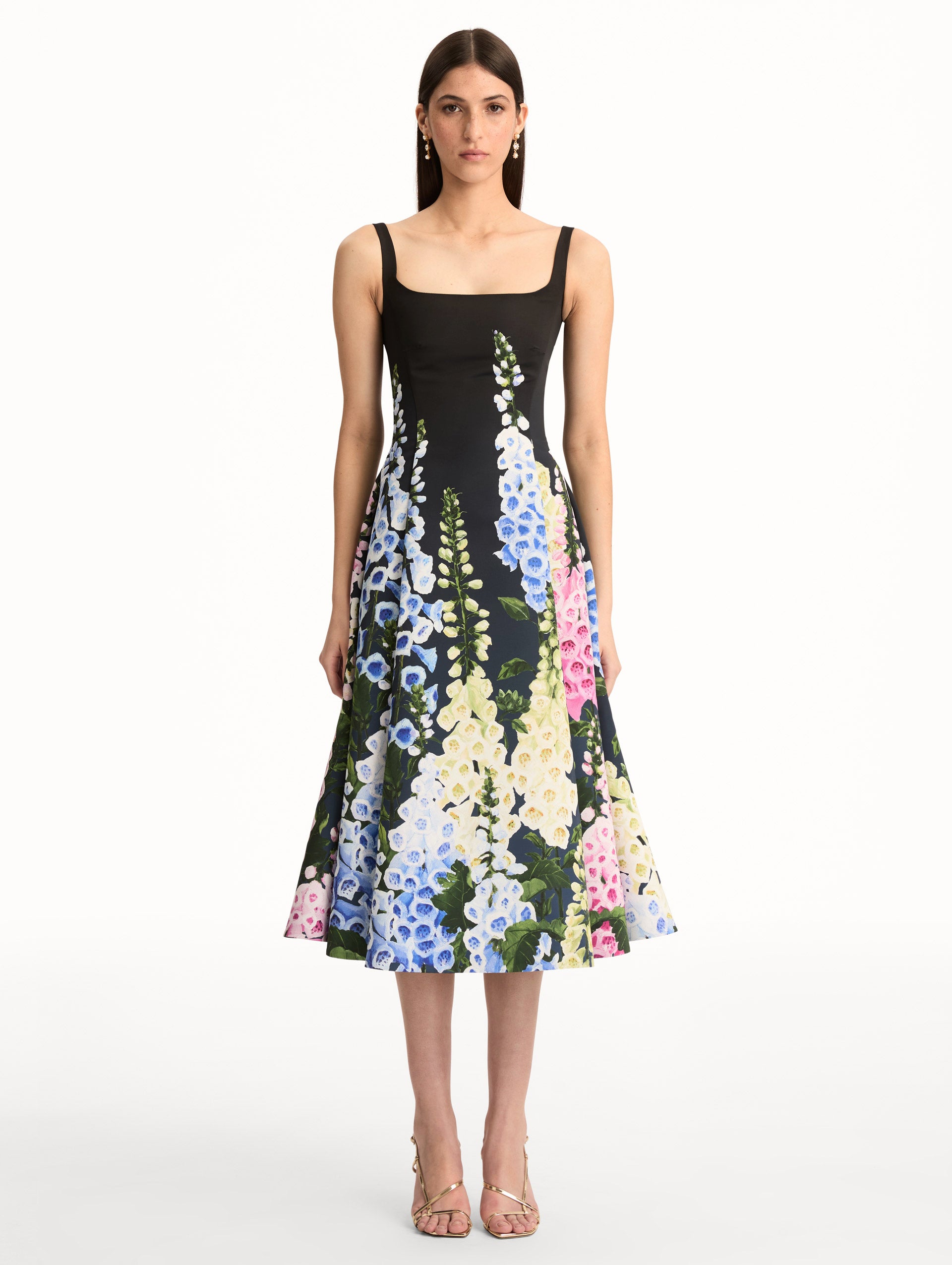 Black Degradé Foxglove Faille Dress featuring a fitted bodice, scoop neckline, and a flared skirt with multicolor foxglove floral print. Front View.