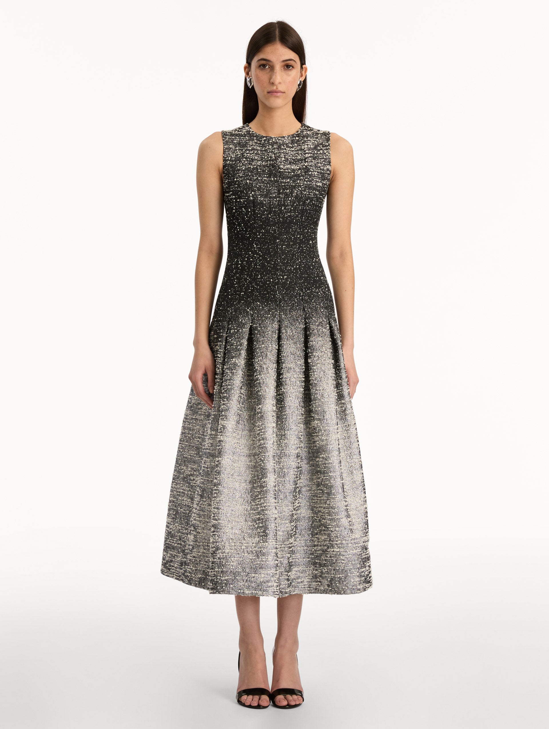 Black and ivory ombré lurex bouclé jacquard dress with fitted silhouette and textured metallic finish. Front View.