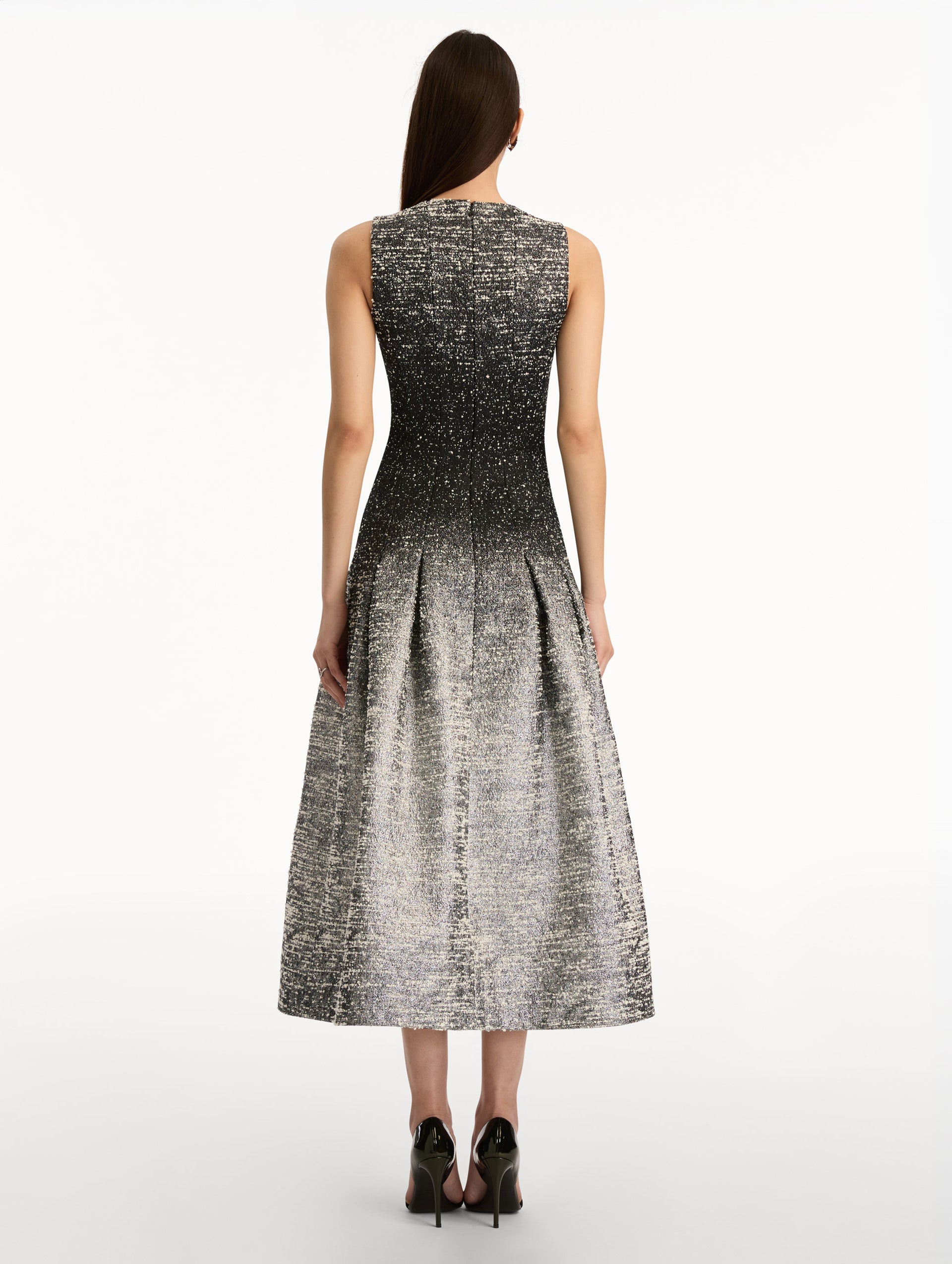 Black and ivory ombré lurex bouclé jacquard dress with fitted silhouette and textured metallic finish. Back View.