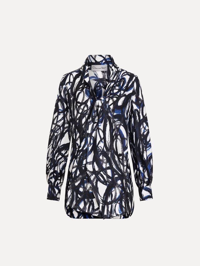 White and Blue Abstract Sketch Silk Twill Blouse featuring a deep V-neckline with knotted drape detail and long sleeves. Front View.