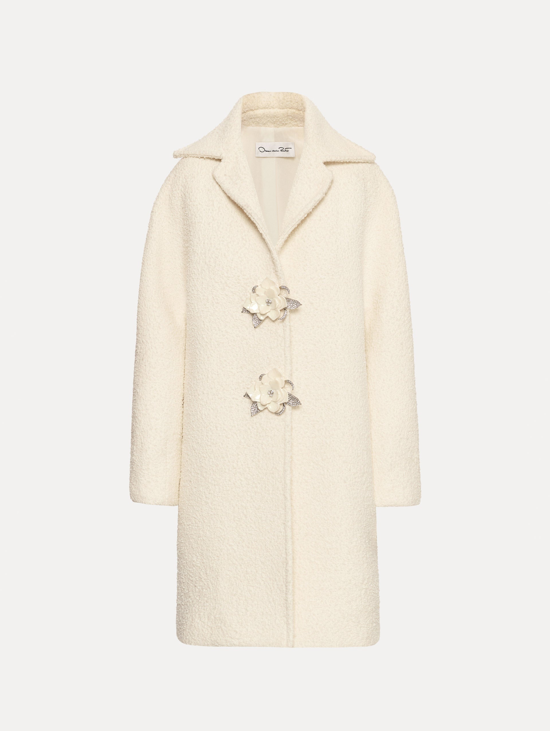 Ivory Floral Button Bouclé Tweed Coat with notched lapels, featuring two floral crystal-embellished clasps at the front.