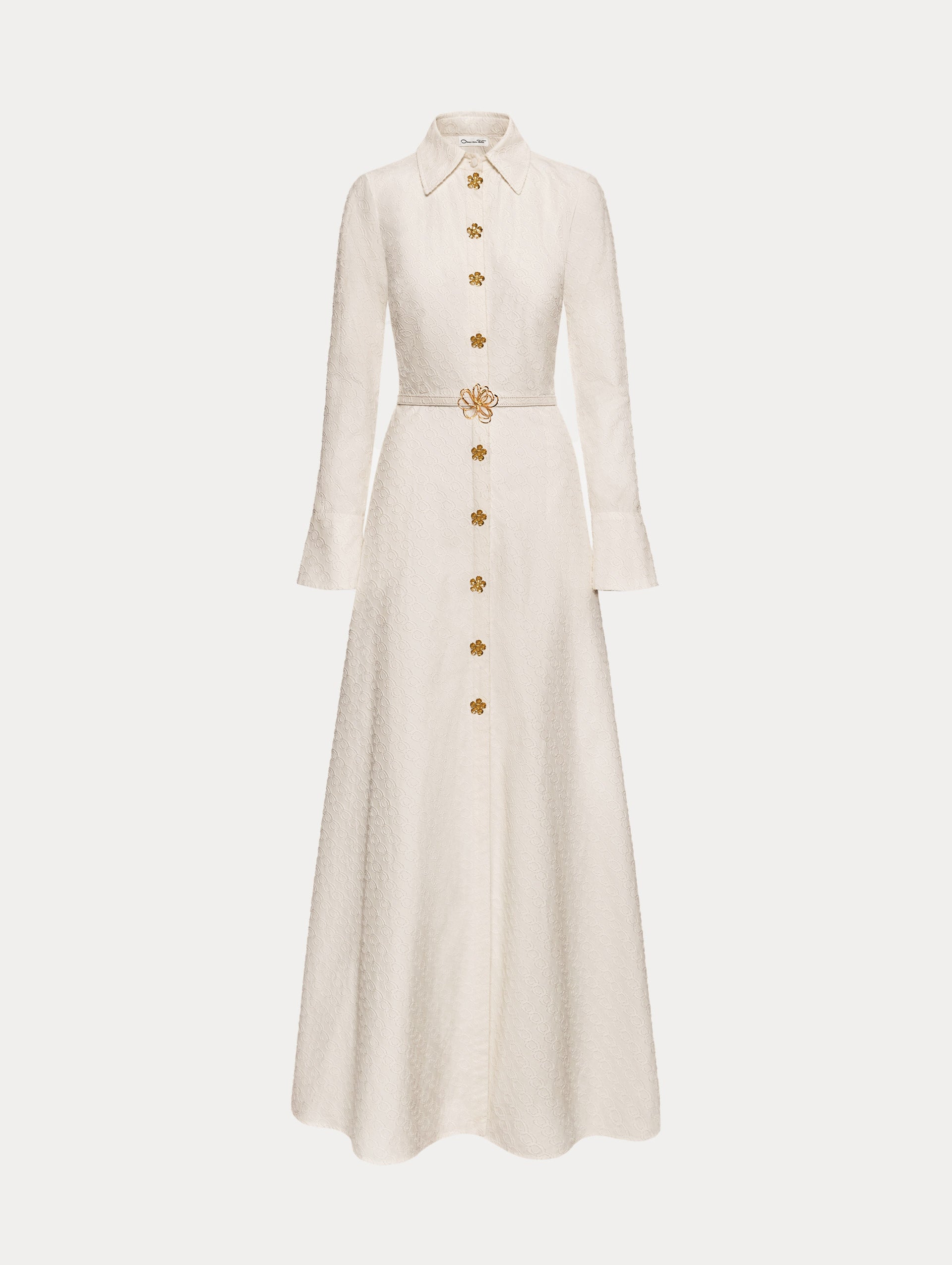 Ivory Oscar Chain-Link Cotton Poplin Caftan featuring a collared neckline, flared sleeves, gold button front, and belted waist with floral buckle.