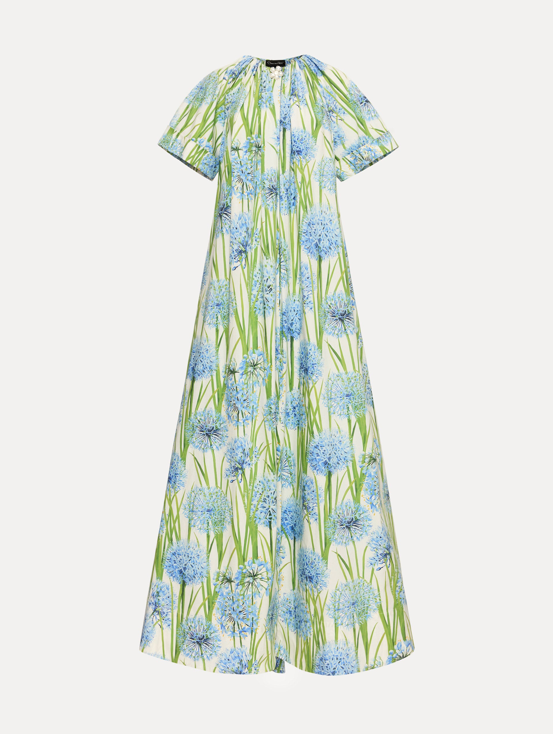 Ivory Allium Cotton Poplin Caftan with short sleeves and gathered neckline, featuring an allover blue floral print with green stems.