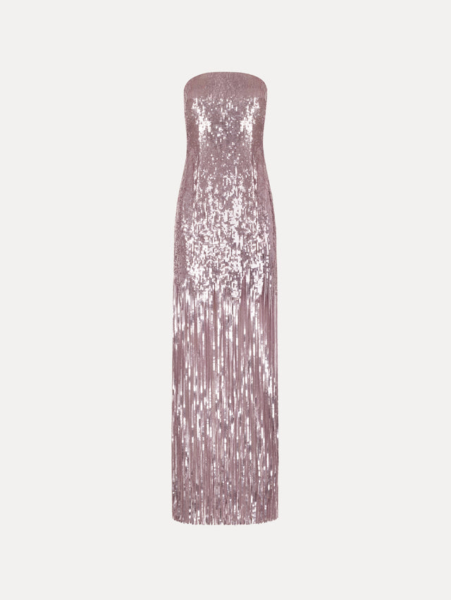 The Sequin Fringe Strapless Gown in the color tulip pink featuring a strapless silhouette, all-over sequins, and fringe skirt.