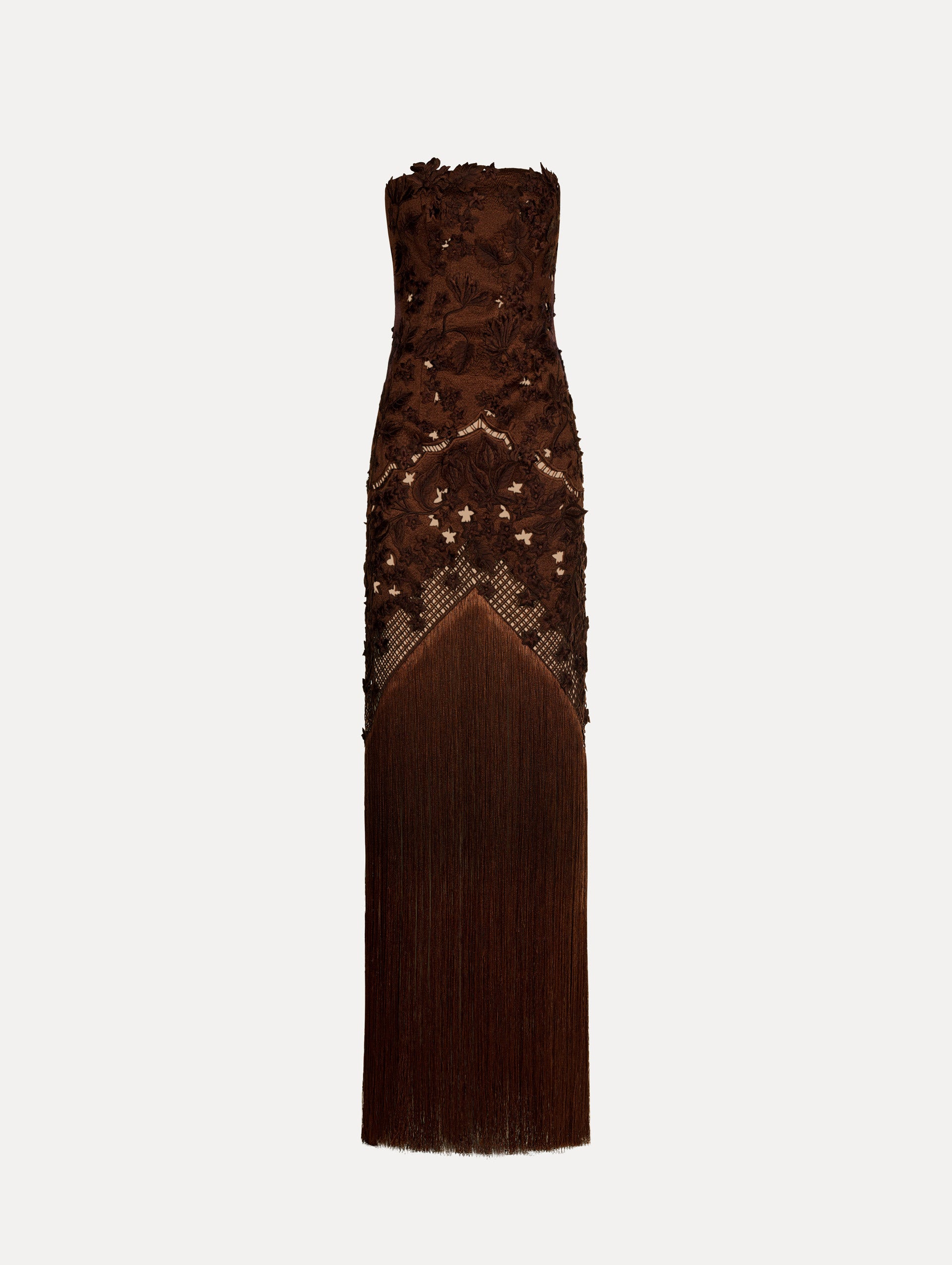 Strapless dress in the color Mahogany Brown with intricate floral lace detail and maxi length full fringe skirt.