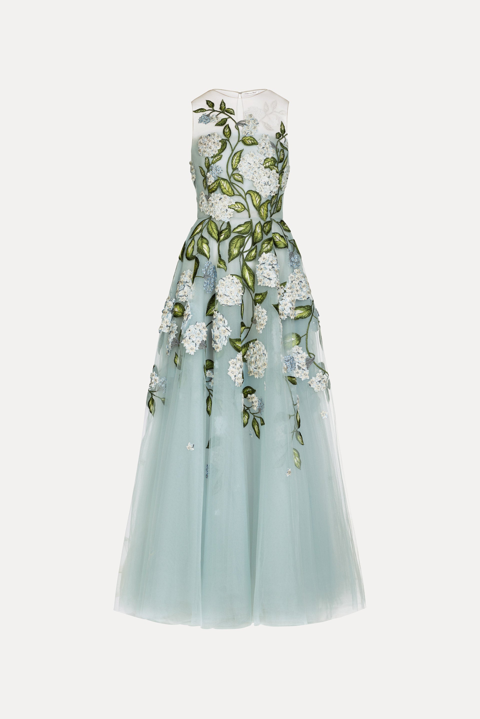 Gown in the color light blue, featuring a sheer neckline, full tulle skirt, and embroidered floral detail.