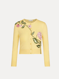Porcelain Flower Threadwork Cropped Cardigan in yellow with button closure and floral embroidery along the neckline and shoulder.