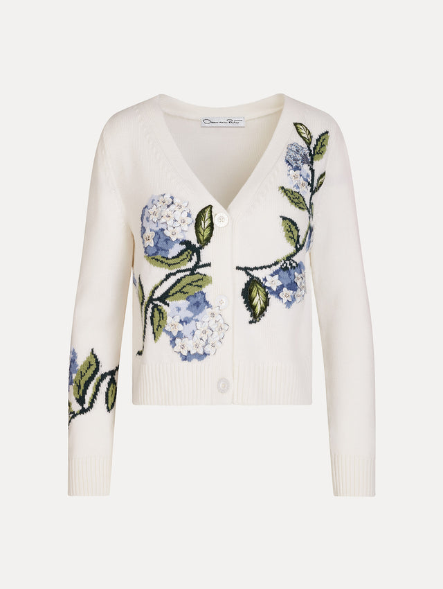 White Porcelain Flower Jacquard Cardigan featuring a V-Neckline and blue and green floral print. Front View.