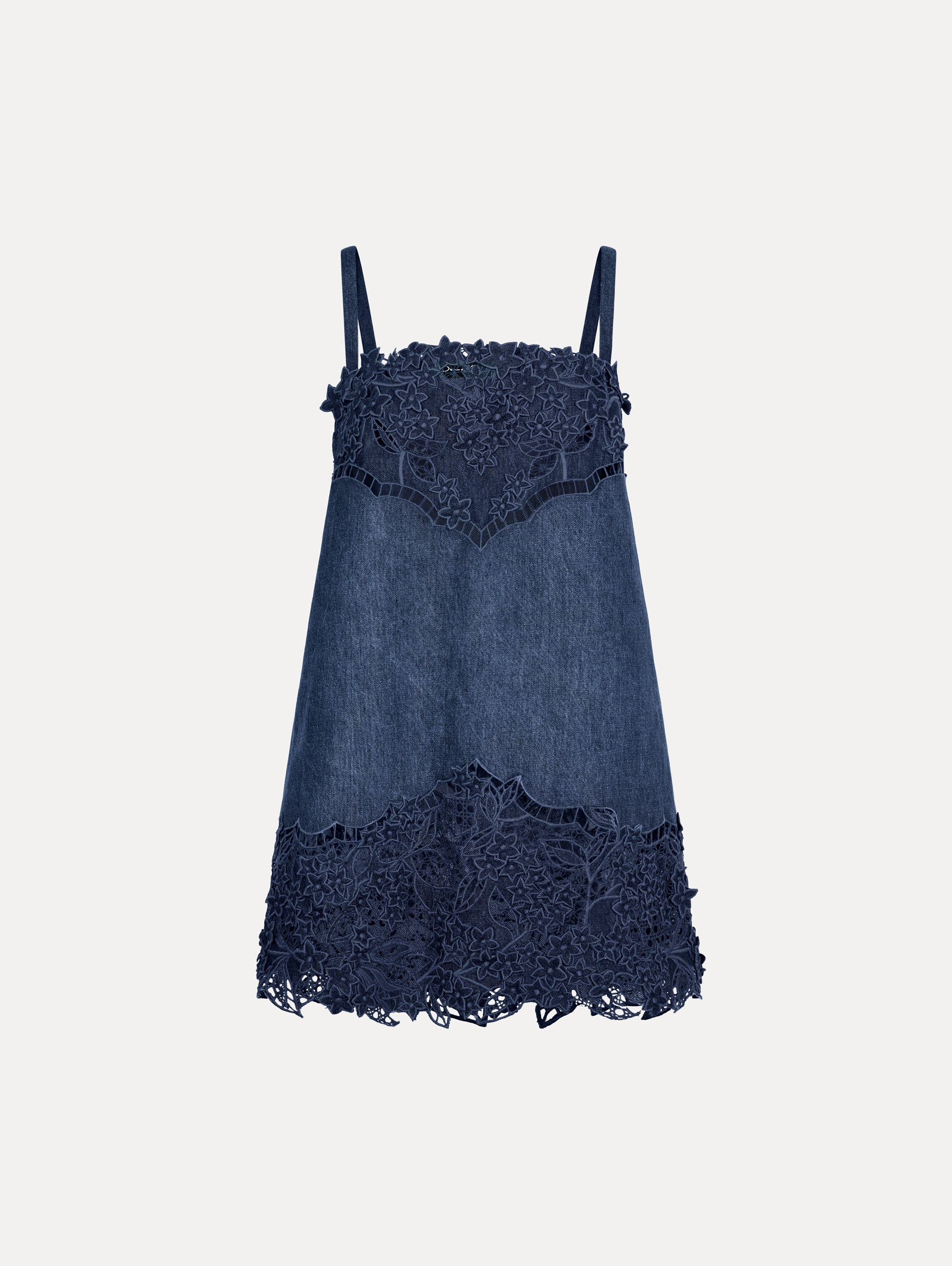 Mini dress in a Denim, Navy Blue color with intricate flower lace detail at neckline and skirt.