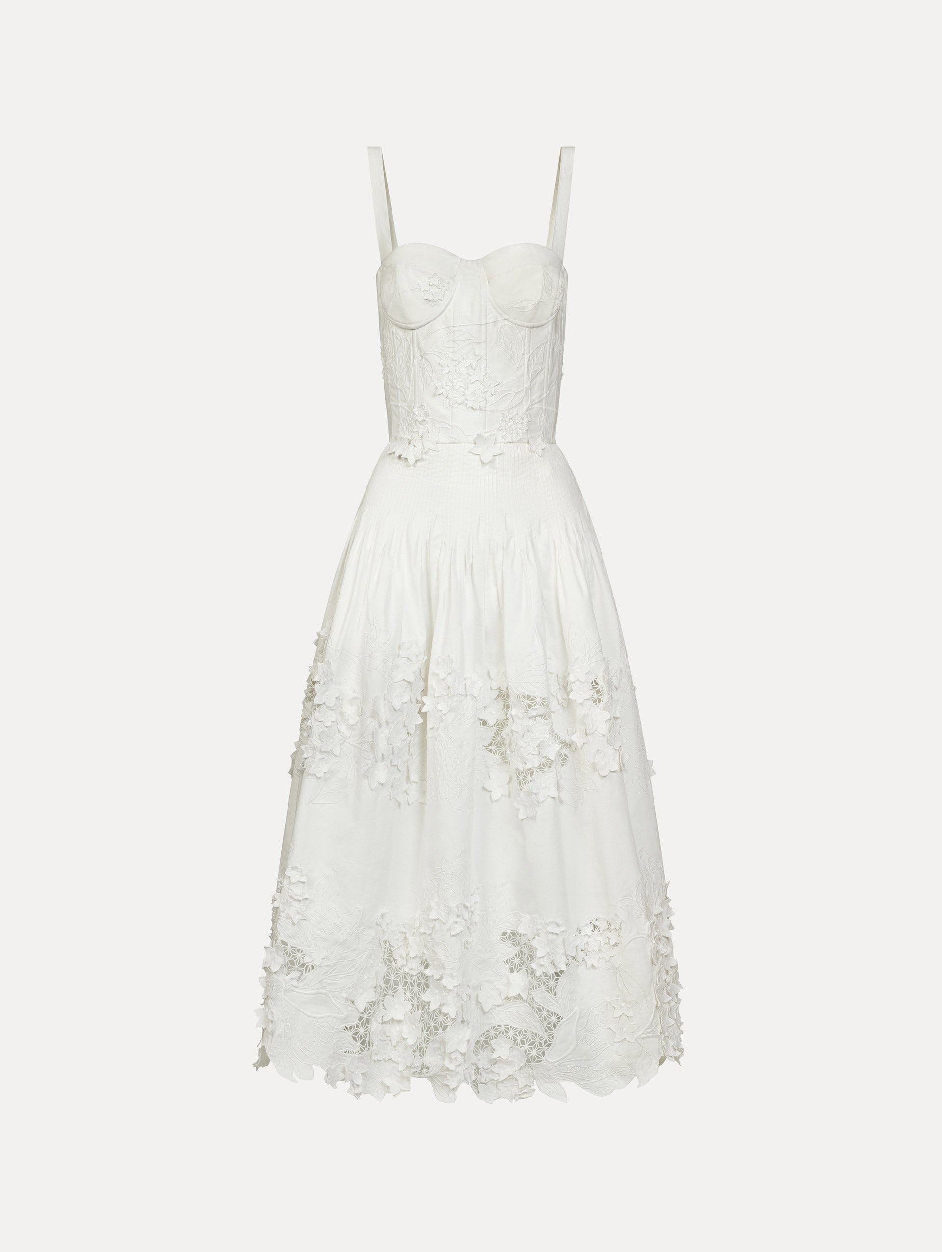 Cotton stretch twill dress. Sculpted bustier bodice with full, midi-length skirt.  porcelain-flower guipure lace along hem. Three-dimensional floral appliqués in layered white-on-white texture. Front View.