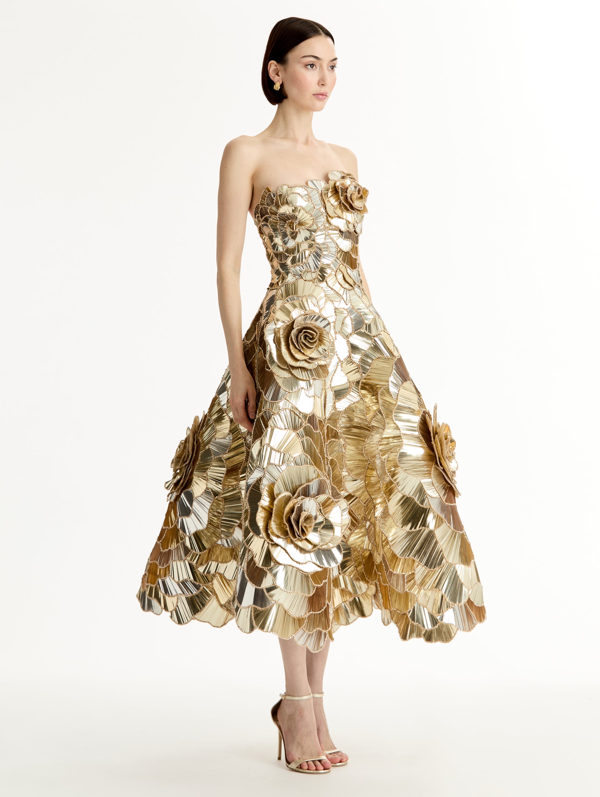 Gold Geometric Sequin Rosette Cocktail Dress with 3D floral applique and metallic finish. Side View.