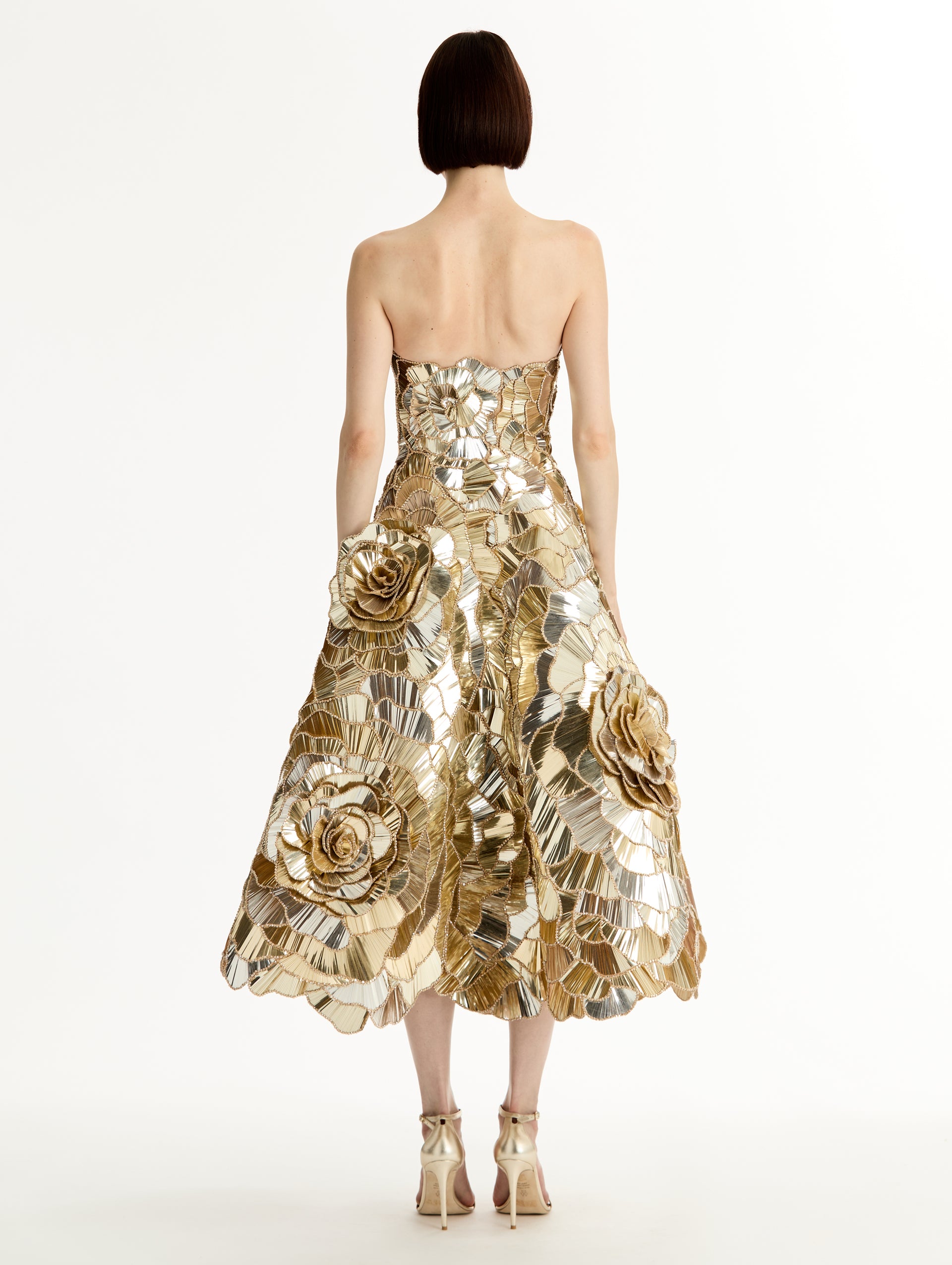 Gold Geometric Sequin Rosette Cocktail Dress with 3D floral applique and metallic finish. Back View.