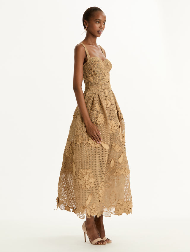 Gold Porcelain Flower Guipure Rattan Cocktail Dress with bustier bodice and pleated full skirt. Side View.