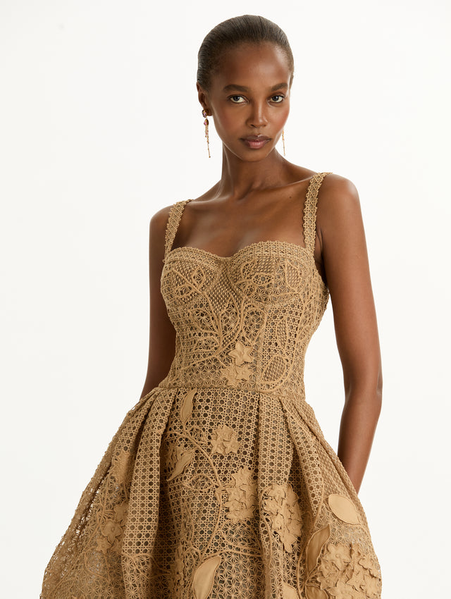 Gold Porcelain Flower Guipure Rattan Cocktail Dress with bustier bodice and pleated full skirt. Zoom View.