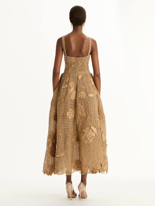 Gold Porcelain Flower Guipure Rattan Cocktail Dress with bustier bodice and pleated full skirt. Back View.