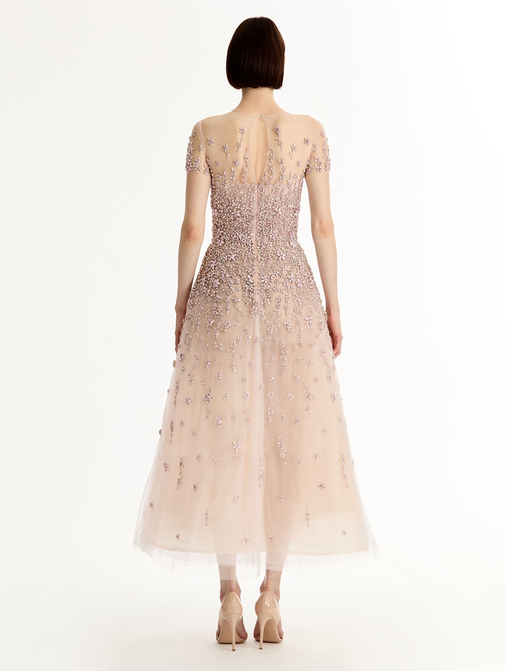 Blush Porcelain Flower Crystal Embroidered Dress with sheer tule neckline and crystal embroidery. Back View.