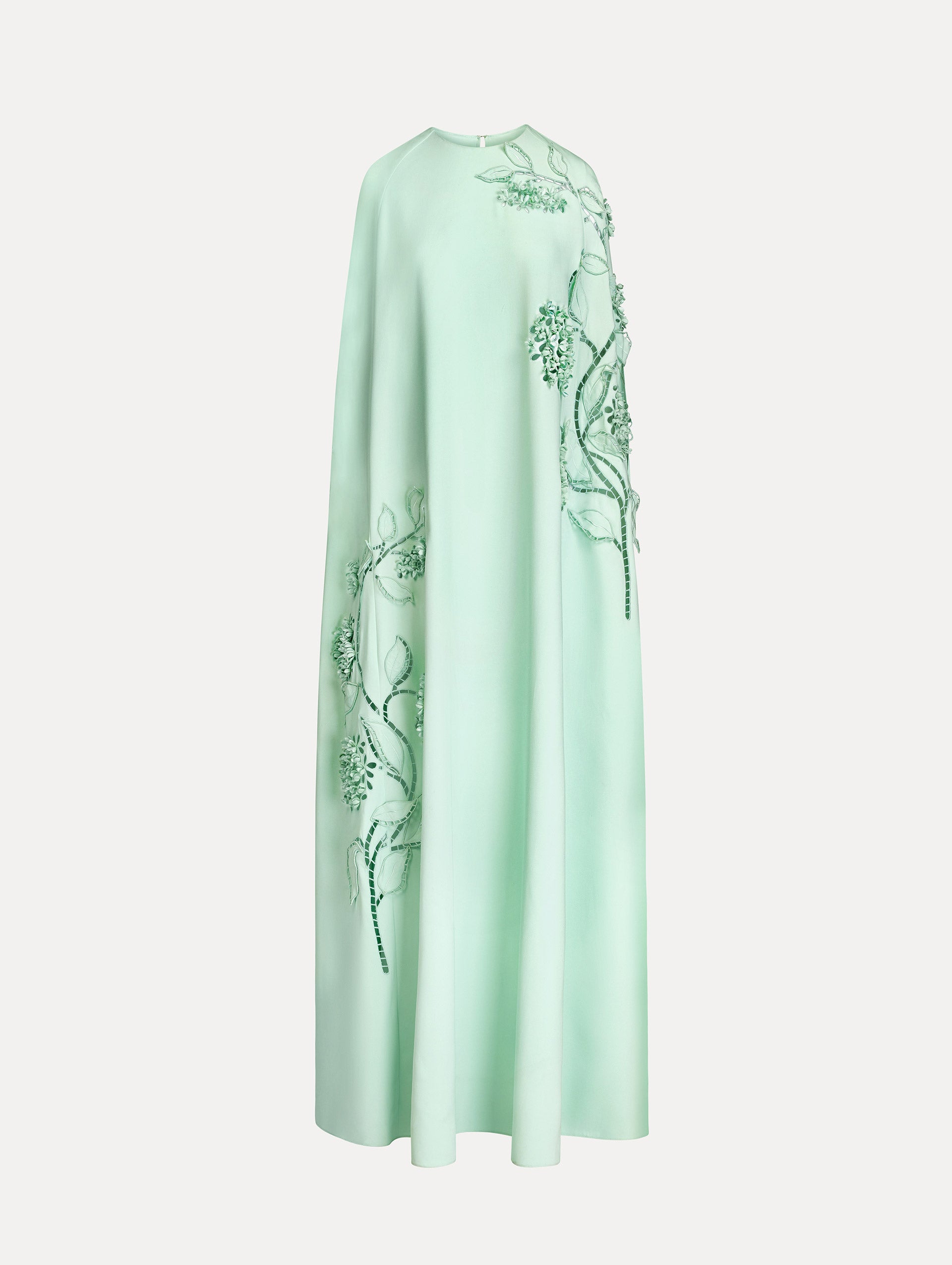Mint caftan in heavy silk stretch georgette. Porcelain-flower threadwork cutouts.  Dimensional petals and delicately openwork stems. Front View. 