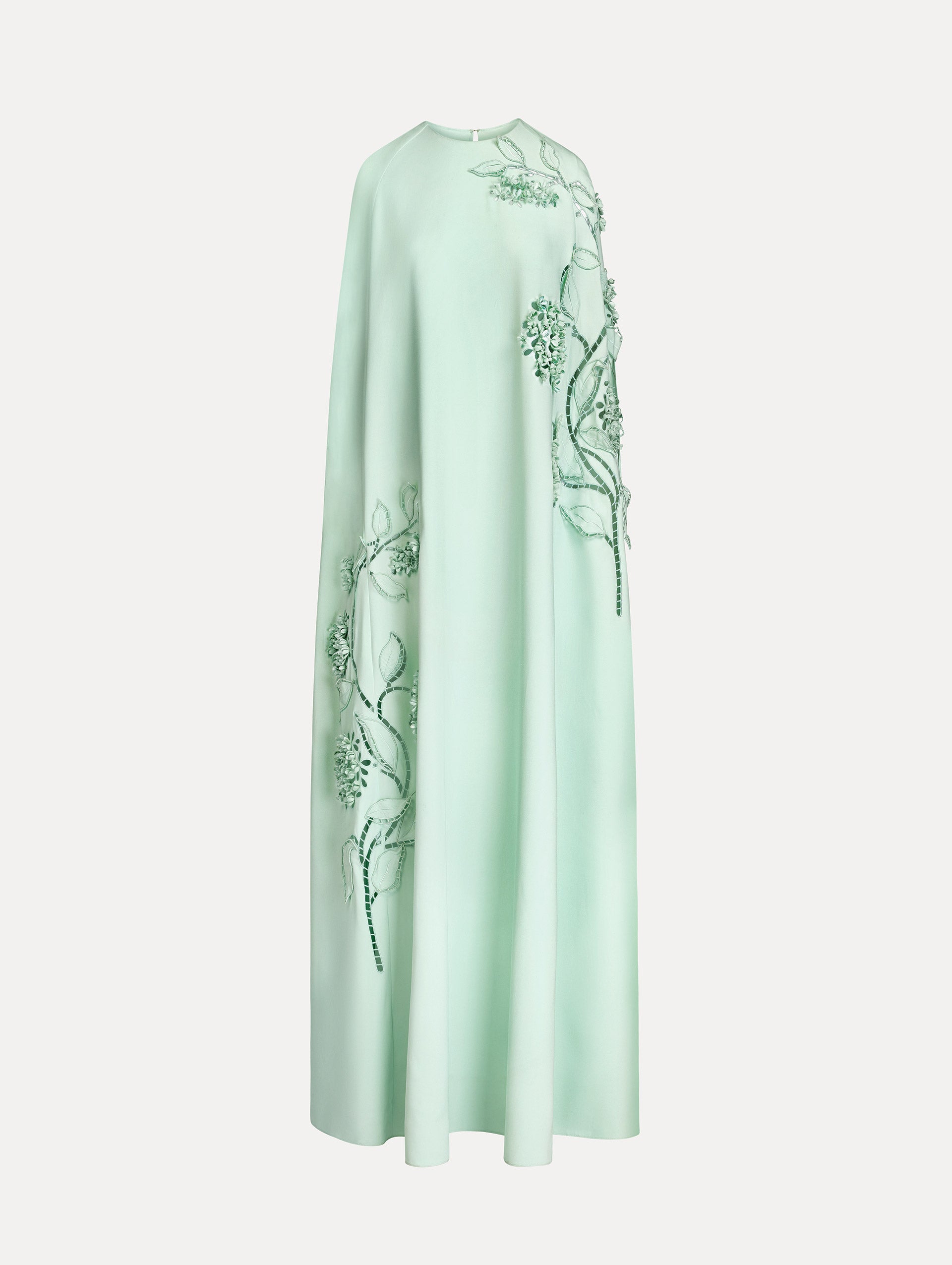 Mint caftan in heavy silk stretch georgette. Porcelain-flower threadwork cutouts.  Dimensional petals and delicately openwork stems. Front View. 