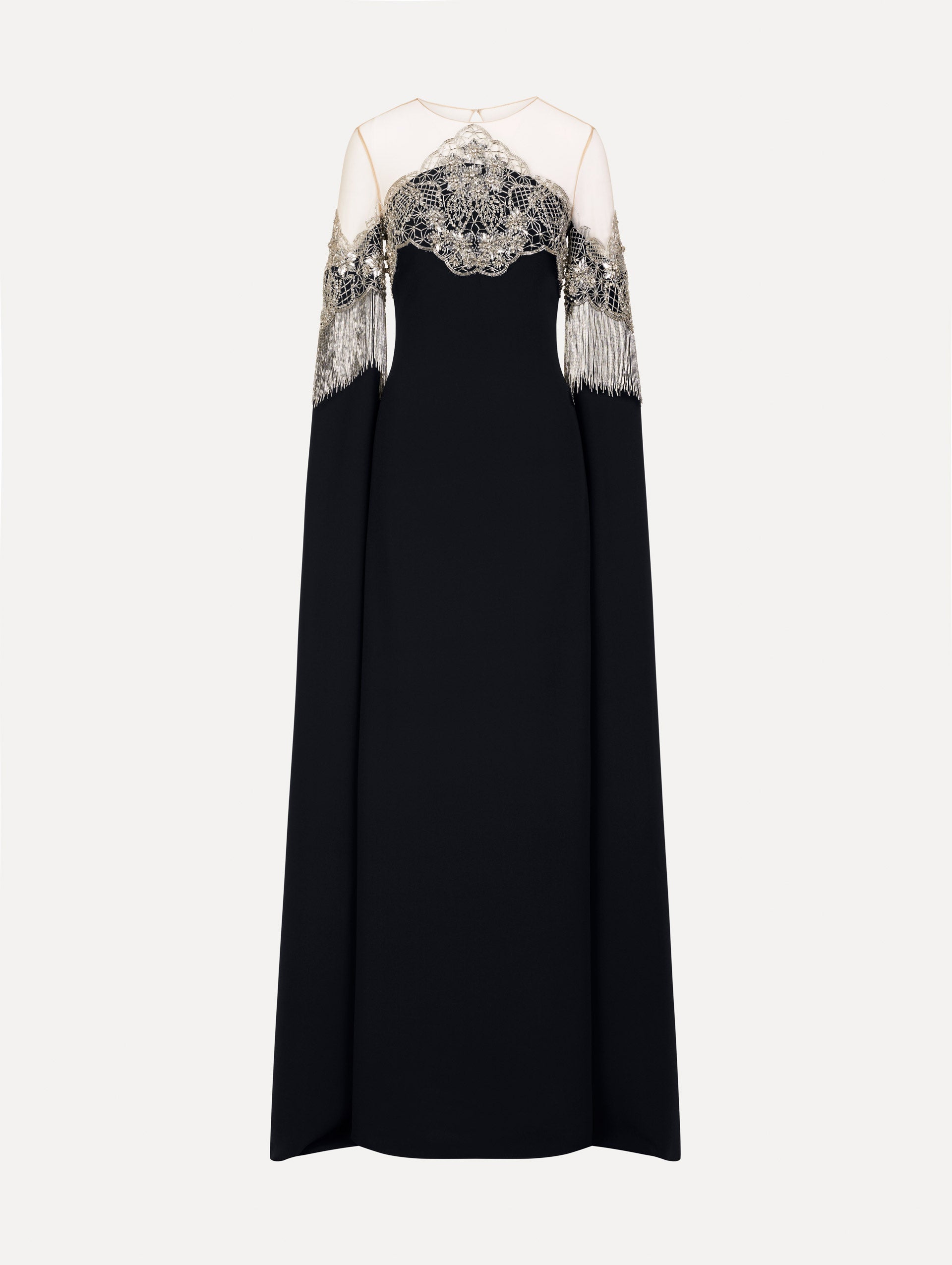 Caftan with sheer illusion tulle neckline and porcelain flower lattice. Hand-applied bugle beads around each motif, and fluid bugle bead fringe on sleeves. Front View. 