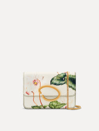 Ivory Cyclamen-Printed O Pochette with green and pink floral motifs and gold hardware. Front View.