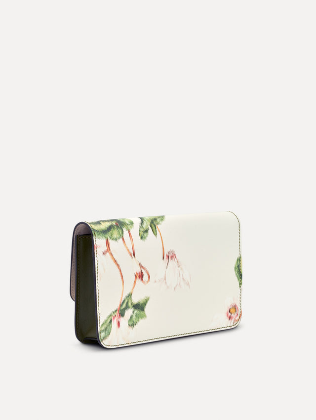 Ivory Cyclamen-Printed O Pochette with green and pink floral motifs and gold hardware. Side View.