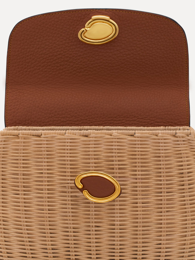 The Mini Poppy in Wicker in brown. Zoom view.
