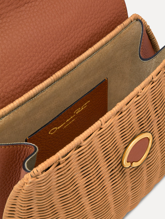 The Mini Poppy in Wicker in brown. Zoom view.